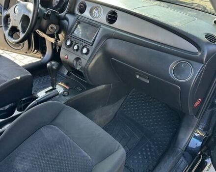 Черный Мицубиси Аутлендер, объемом двигателя 2.4 л и пробегом 307 тыс. км за 5600 $, фото 17 на Automoto.ua