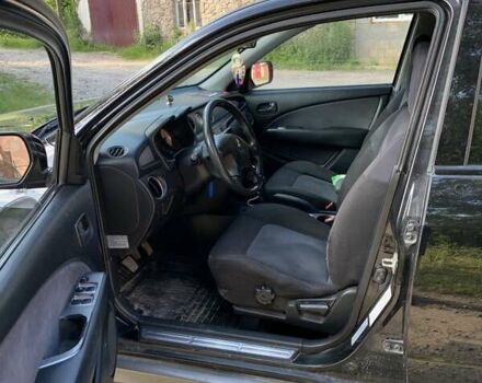 Чорний Міцубісі Аутлендер, об'ємом двигуна 2 л та пробігом 200 тис. км за 7000 $, фото 7 на Automoto.ua