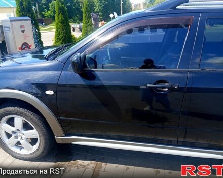 Черный Мицубиси Аутлендер, объемом двигателя 2.4 л и пробегом 270 тыс. км за 7800 $, фото 6 на Automoto.ua