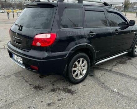 Черный Мицубиси Аутлендер, объемом двигателя 2.4 л и пробегом 190 тыс. км за 6800 $, фото 5 на Automoto.ua