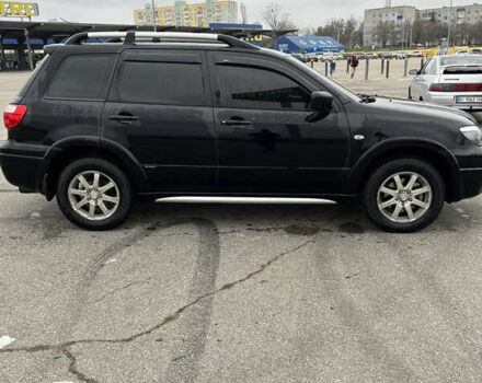 Чорний Міцубісі Аутлендер, об'ємом двигуна 2.38 л та пробігом 190 тис. км за 6800 $, фото 9 на Automoto.ua