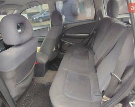 Черный Мицубиси Аутлендер, объемом двигателя 2 л и пробегом 330 тыс. км за 4997 $, фото 14 на Automoto.ua