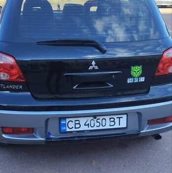 Міцубісі Аутлендер 2005 у Чернігові на Automoto.ua Чорний Міцубісі Аутлендер, об'ємом двигуна 2.38 л та пробігом 224 тис. км за 6000 $, фото 9 на Automoto.ua