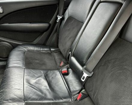 Черный Мицубиси Аутлендер, объемом двигателя 2.4 л и пробегом 258 тыс. км за 5400 $, фото 6 на Automoto.ua