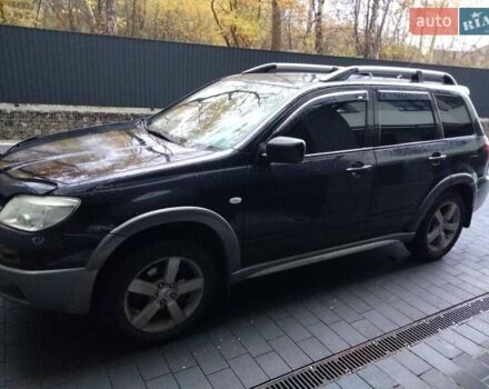Черный Мицубиси Аутлендер, объемом двигателя 2 л и пробегом 380 тыс. км за 5000 $, фото 2 на Automoto.ua