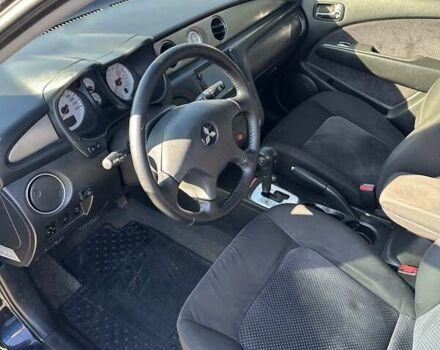 Черный Мицубиси Аутлендер, объемом двигателя 2.4 л и пробегом 307 тыс. км за 5600 $, фото 15 на Automoto.ua