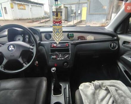 Черный Мицубиси Аутлендер, объемом двигателя 2 л и пробегом 330 тыс. км за 4997 $, фото 15 на Automoto.ua