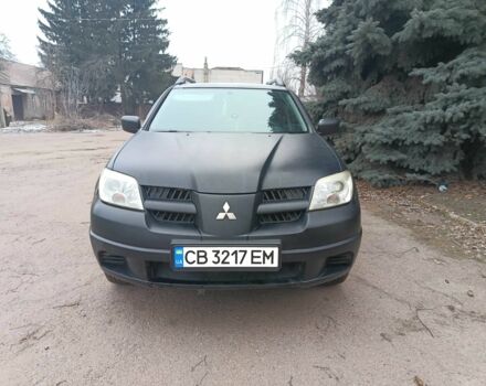 Черный Мицубиси Аутлендер, объемом двигателя 2 л и пробегом 495 тыс. км за 4400 $, фото 7 на Automoto.ua