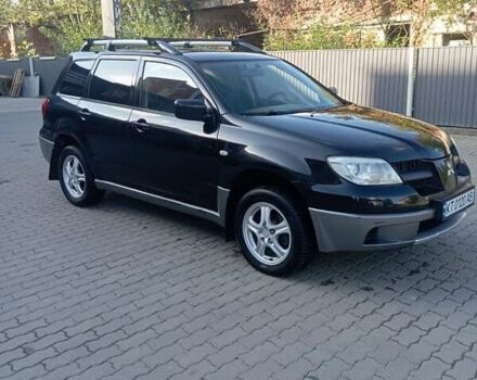 Черный Мицубиси Аутлендер, объемом двигателя 2 л и пробегом 297 тыс. км за 5800 $, фото 13 на Automoto.ua