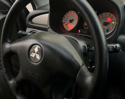 Чорний Міцубісі Аутлендер, об'ємом двигуна 2.38 л та пробігом 247 тис. км за 5499 $, фото 54 на Automoto.ua