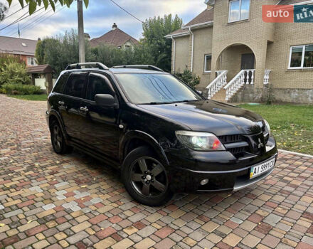 Чорний Міцубісі Аутлендер, об'ємом двигуна 2.38 л та пробігом 247 тис. км за 5499 $, фото 32 на Automoto.ua