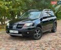 Чорний Міцубісі Аутлендер, об'ємом двигуна 2.38 л та пробігом 247 тис. км за 5499 $, фото 40 на Automoto.ua