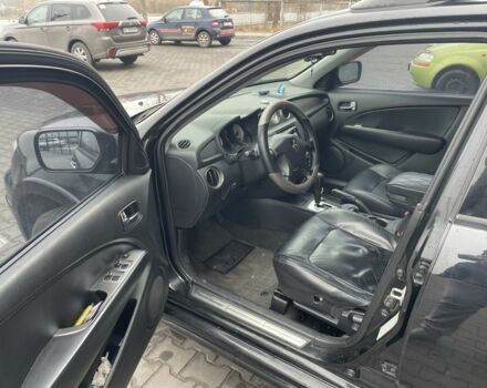 Черный Мицубиси Аутлендер, объемом двигателя 2.4 л и пробегом 234 тыс. км за 5499 $, фото 21 на Automoto.ua