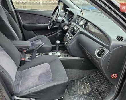 Черный Мицубиси Аутлендер, объемом двигателя 2.4 л и пробегом 167 тыс. км за 6150 $, фото 19 на Automoto.ua