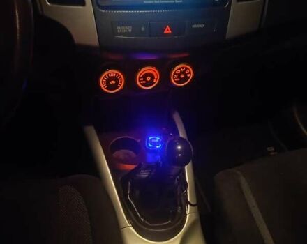 Чорний Міцубісі Аутлендер, об'ємом двигуна 2 л та пробігом 283 тис. км за 9000 $, фото 9 на Automoto.ua