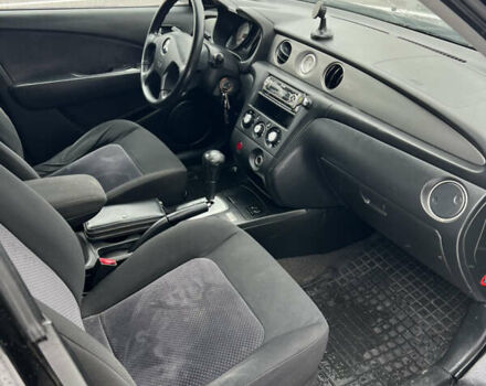 Чорний Міцубісі Аутлендер, об'ємом двигуна 2.4 л та пробігом 308 тис. км за 4700 $, фото 9 на Automoto.ua