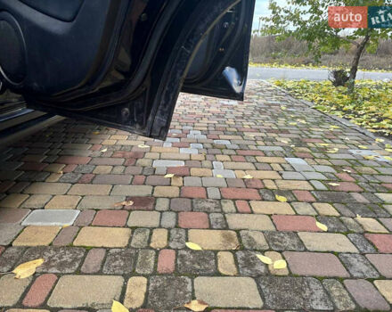 Чорний Міцубісі Аутлендер, об'ємом двигуна 2.38 л та пробігом 247 тис. км за 5499 $, фото 27 на Automoto.ua