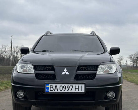 Черный Мицубиси Аутлендер, объемом двигателя 2 л и пробегом 230 тыс. км за 6300 $, фото 7 на Automoto.ua