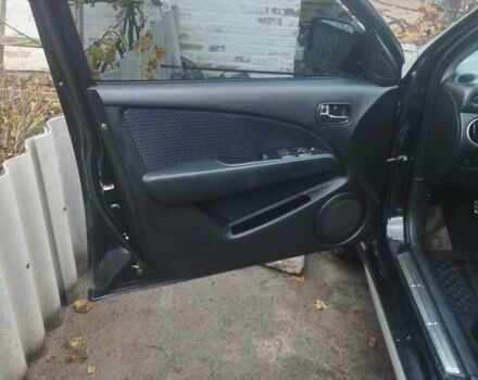 Черный Мицубиси Аутлендер, объемом двигателя 2.4 л и пробегом 280 тыс. км за 5455 $, фото 10 на Automoto.ua