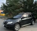 Черный Мицубиси Аутлендер, объемом двигателя 2.4 л и пробегом 333 тыс. км за 5999 $, фото 6 на Automoto.ua