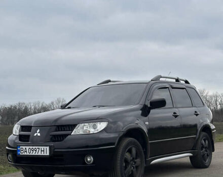Черный Мицубиси Аутлендер, объемом двигателя 2 л и пробегом 230 тыс. км за 6300 $, фото 6 на Automoto.ua