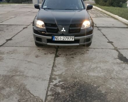 Черный Мицубиси Аутлендер, объемом двигателя 2 л и пробегом 169 тыс. км за 3500 $, фото 6 на Automoto.ua