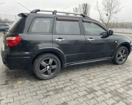 Черный Мицубиси Аутлендер, объемом двигателя 2.4 л и пробегом 234 тыс. км за 5499 $, фото 16 на Automoto.ua