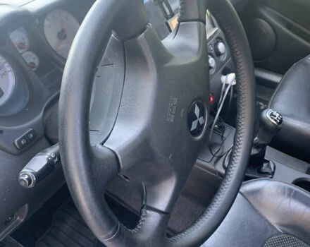 Черный Мицубиси Аутлендер, объемом двигателя 2 л и пробегом 212 тыс. км за 6000 $, фото 17 на Automoto.ua