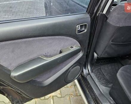 Черный Мицубиси Аутлендер, объемом двигателя 2.4 л и пробегом 167 тыс. км за 6150 $, фото 23 на Automoto.ua