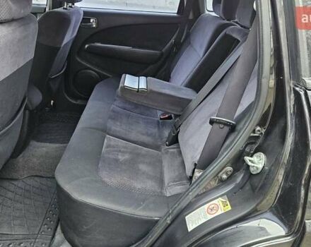 Черный Мицубиси Аутлендер, объемом двигателя 2.4 л и пробегом 167 тыс. км за 6150 $, фото 22 на Automoto.ua