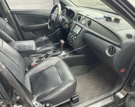 Черный Мицубиси Аутлендер, объемом двигателя 2.4 л и пробегом 234 тыс. км за 5499 $, фото 19 на Automoto.ua