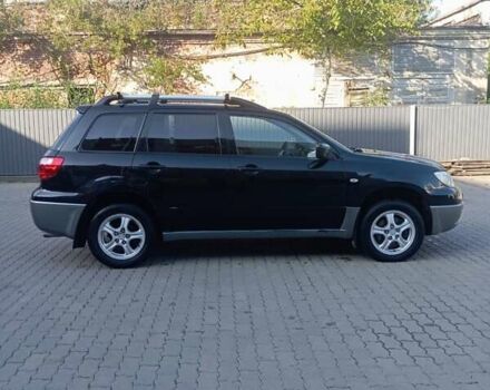 Черный Мицубиси Аутлендер, объемом двигателя 2 л и пробегом 297 тыс. км за 5800 $, фото 10 на Automoto.ua