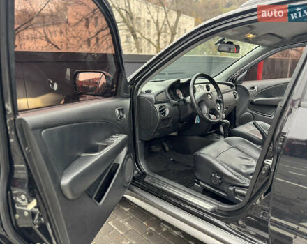 Черный Мицубиси Аутлендер, объемом двигателя 2.4 л и пробегом 242 тыс. км за 6800 $, фото 25 на Automoto.ua