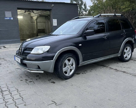 Черный Мицубиси Аутлендер, объемом двигателя 2 л и пробегом 280 тыс. км за 4999 $, фото 13 на Automoto.ua