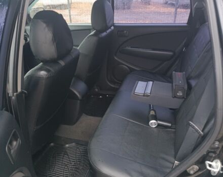 Чорний Міцубісі Аутлендер, об'ємом двигуна 2 л та пробігом 260 тис. км за 5400 $, фото 5 на Automoto.ua