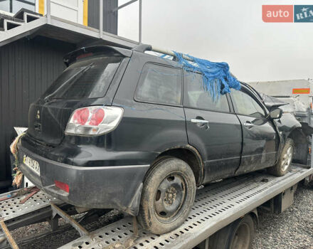 Черный Мицубиси Аутлендер, объемом двигателя 2.4 л и пробегом 240 тыс. км за 2200 $, фото 15 на Automoto.ua