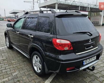 Черный Мицубиси Аутлендер, объемом двигателя 2.4 л и пробегом 167 тыс. км за 6150 $, фото 10 на Automoto.ua