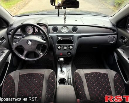 Черный Мицубиси Аутлендер, объемом двигателя 2.4 л и пробегом 263 тыс. км за 5999 $, фото 6 на Automoto.ua