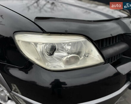 Черный Мицубиси Аутлендер, объемом двигателя 2.4 л и пробегом 242 тыс. км за 6800 $, фото 6 на Automoto.ua