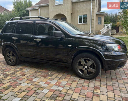 Чорний Міцубісі Аутлендер, об'ємом двигуна 2.38 л та пробігом 247 тис. км за 5499 $, фото 31 на Automoto.ua