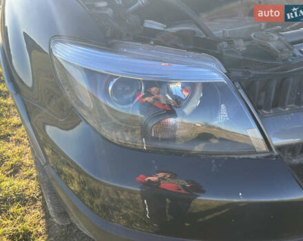 Черный Мицубиси Аутлендер, объемом двигателя 2.38 л и пробегом 230 тыс. км за 5350 $, фото 16 на Automoto.ua