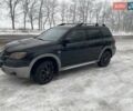 Черный Мицубиси Аутлендер, объемом двигателя 2.38 л и пробегом 420 тыс. км за 4250 $, фото 1 на Automoto.ua
