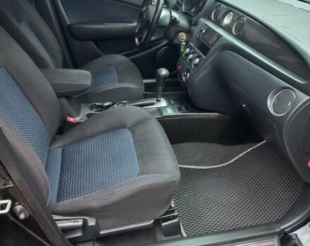 Черный Мицубиси Аутлендер, объемом двигателя 2.4 л и пробегом 256 тыс. км за 6900 $, фото 8 на Automoto.ua