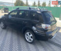 Черный Мицубиси Аутлендер, объемом двигателя 2 л и пробегом 212 тыс. км за 6000 $, фото 6 на Automoto.ua