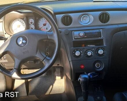 Черный Мицубиси Аутлендер, объемом двигателя 2.4 л и пробегом 185 тыс. км за 7500 $, фото 3 на Automoto.ua