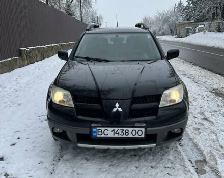 Чорний Міцубісі Аутлендер, об'ємом двигуна 2.4 л та пробігом 308 тис. км за 4700 $, фото 1 на Automoto.ua