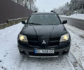 Чорний Міцубісі Аутлендер, об'ємом двигуна 2.4 л та пробігом 308 тис. км за 4700 $, фото 1 на Automoto.ua