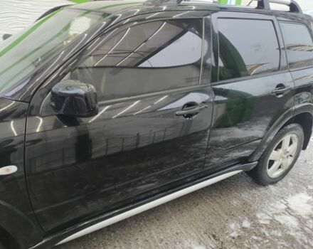 Чорний Міцубісі Аутлендер, об'ємом двигуна 2.4 л та пробігом 360 тис. км за 5200 $, фото 2 на Automoto.ua