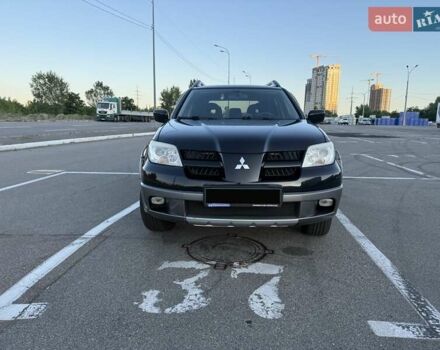 Черный Мицубиси Аутлендер, объемом двигателя 2 л и пробегом 158 тыс. км за 6700 $, фото 9 на Automoto.ua