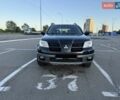 Черный Мицубиси Аутлендер, объемом двигателя 2 л и пробегом 158 тыс. км за 6700 $, фото 9 на Automoto.ua